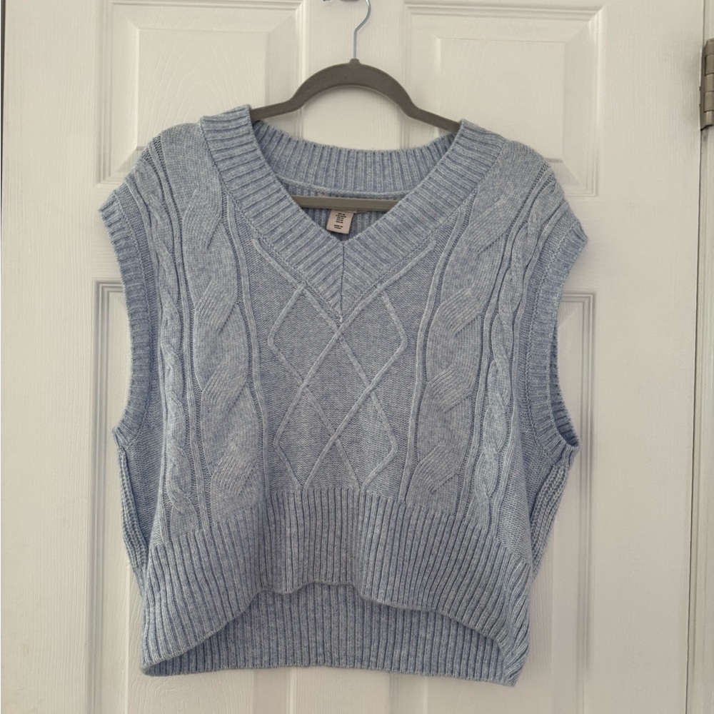 Blue sweater vest